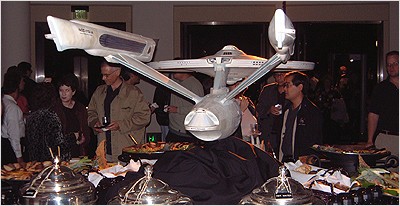 Star Trek production alums Judith and Garfield Reeves-Stevens and Michael Okuda by the model